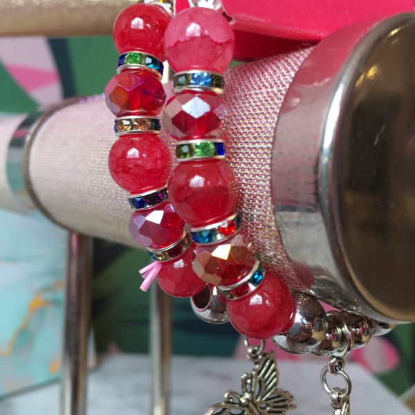 pulsera butterfly, perlas rojas y transparentes- ropa gallardo-ecuador