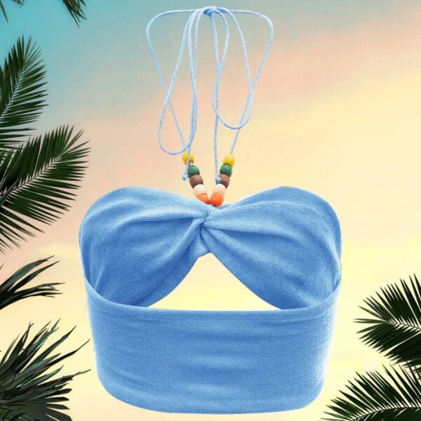 Blusa beach, con tiras para amarrar en el cuello, lleva abertura en la parte baja de los senos, tiene perlas que le da toques especiales-ropa gallardo-ecuador